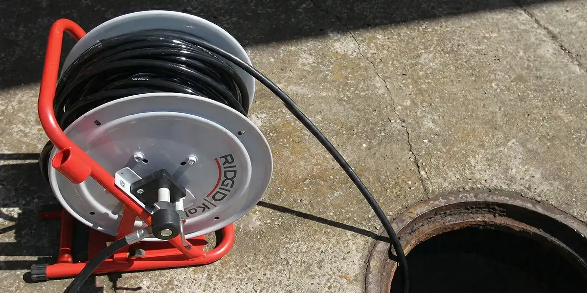 sewer rodding equipment prepared to clear clogged sewer lines in San Antonio, TX